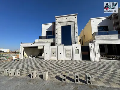 Luxury villa in Al-Haliu, 5 master bedrooms, with a majlis, living room, and central air conditioning. Price includes fees.