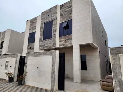 Hello  For rent, a villa in Al-Zahia area  Ground, first and roof consisting of 6 master bedrooms, a board, a lounge, a kitchen, a spacious monster, a maid's room and a a two kitchens.  And an open ro