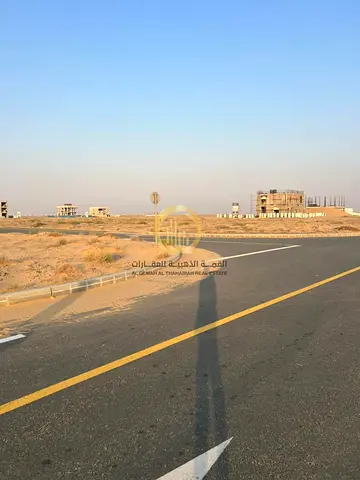 For sale in Al Qurtah Nursery: a residential investment plot with an area of 3,294 sq ft, with a permit for a villa with a ground floor + 2 floors.
