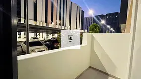 Spacious luxurious studio apartment with balcony and kitchen appliances