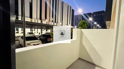 Spacious luxurious studio apartment with balcony and kitchen appliances