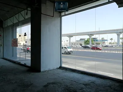 MAIN ROAD FACING SHOWROOM IN ABU HAIL HIGH VISIBILITY
