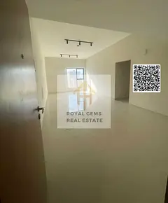 Bright &amp; Spacious Unfurnished 2-BHK in SRS Tower, Ajman | Gym + Covered Parking.