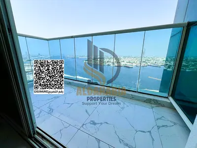 🏡 للبيع شقة غرفتين وصالة في الواحة تاور 2 – إطلالة بانورامية على خور عجمان 🌊✨