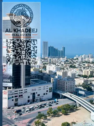 For sale: Two bedrooms and a living room with a view of the sea and Grand Mall in Al Nuaimiya 3, City Towers, near all services.
