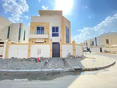Villa for rent in Ajman, Al Yasmeen area Corner of two streets Two floors and a roof Central air con
