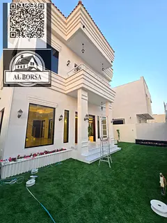 Villa for sale in Al Amrah, Ajman. 4 master bedrooms, 2 living rooms, a majlis, and a large equipped