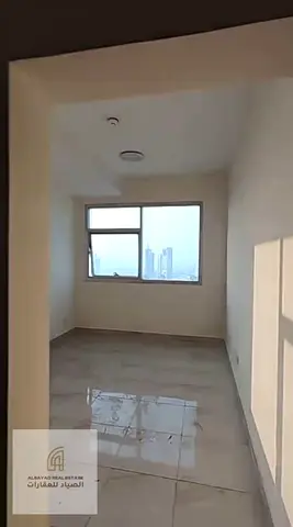 A room and a hall for sale in Abbco Al Nahda Tower, with parking