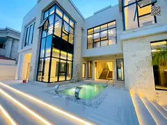 Luxury villa in the most prestigious area of ​​Ajman with a private pool, including electricity,