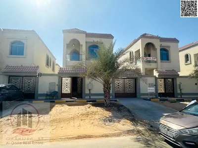 Villa for sale in Ajman Al Helio, 4 bedrooms, majlis and hall, excellent location, includes water, electricity and central air conditioning