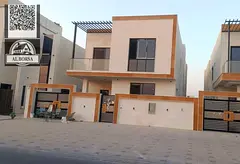 Villa for sale in Al Helio 2, Ajman. 5 master bedrooms, majlis, living room, spacious kitchen with m