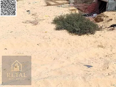 فى وسط البنايات السكنية ، ارض للبيع .