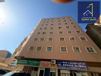 للبيع بناية سكنية تجارية في منطقة المجرة – حي الشرق، إمارة الشارقة  بناية بموقع مميز زاوية على شارعين ومقابل مسجد، تقع في منطقة حيوية ومخدومة بالكامل