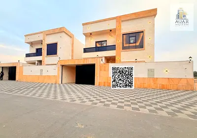 Villa for sale, freehold, open to all nationalities, registration fees included. Five master bedrooms, living room, majlis, dining room, kitchen, maid's room, and preparation kitchen. Built-up area: 3