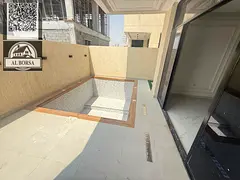 For sale, a villa in Al Helio 2, Ajman,4 master bedrooms, a living room, two halls, a maid's roo