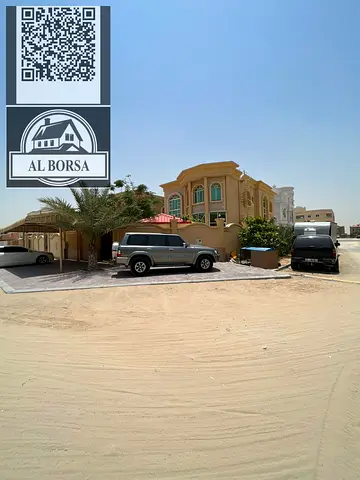 Villa for rent in Al Muwaihat 1, corner unit, 6 master bedrooms, external majlis, living room with kitchen and maid's room
