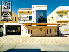 For sale in Al Yasmin, Ajman: a villa with 5 master bedrooms, a majlis, a living room, and a maid