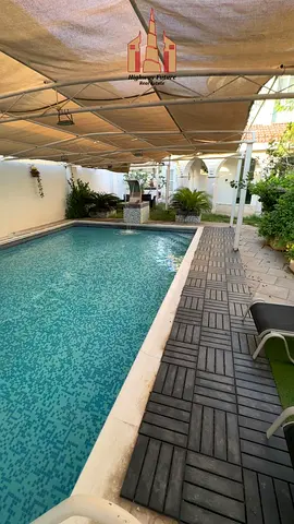5 Bed room with swimming pool 2 Hall Big gardan parking Maids room Near Beach neat and clean Balcony