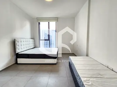 🔥 استلم مفتاحك الآن | شقة 1BR ملكية بإطلالة "دايركت" على المسبح 🔥