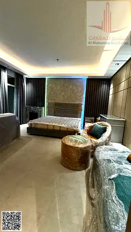 For sale in Ajman: a luxurious, fully furnished studio apartment with décor in Horizon Towers, featuring a balcony. 760 sq ft. Asking : AED 305,000