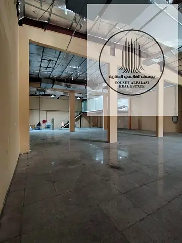 مستودع مميز للإيجار في الجرف الصناعية 3 – على الطريق الرئيسي مباشرة | مكيف بالكامل