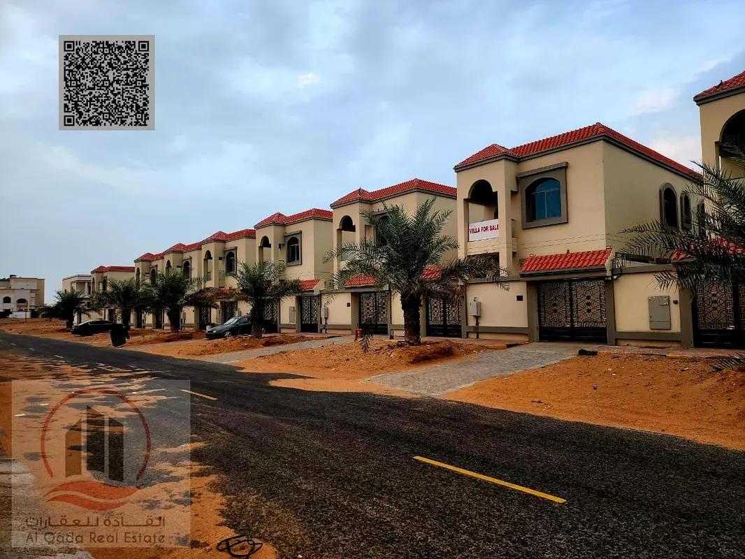 Villa for sale in Ajman, Al Helio area. Electricity and air conditioning are ready. It consists of 5 master bedrooms, a majlis, a living room, and a m