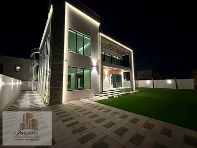 Modern villa for sale in Al Houshi Sharjah with luxurious personal finishes 7 master bedrooms spacious areas large yard prime location near the mall m