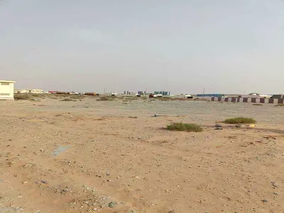 Industrial land for sale in Al Qasimia, with an area of ​​19,370 square feet.