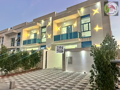 Direct from the owner, including registration and ownership fees: A villa in one of Ajman's most luxurious villas, built and finished to a super deluxe standard, with very large rooms and a spacious l