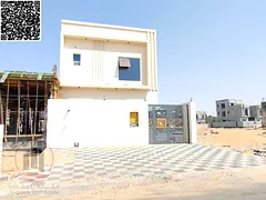 Villa for sale in Ajman, Al Helio area, 4 master bedrooms, majlis, living room, and maid's room.