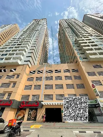 Two-bedroom apartments in **Ajman One** towers, first tenant, immediate delivery!