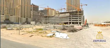Al-Amrah, Ajman: Residential/commercial land (G+41) with permit for apartment sales. Freehold owners