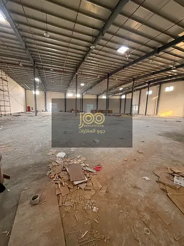 For rent: A large complex in Umm Al Thu'ub area consisting of a warehouse and workers' accommodation, suitable for all activities.