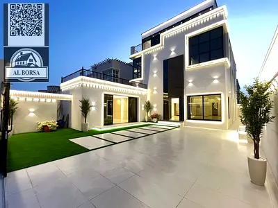 Villa for sale in Al Rawda 3, Ajman. 6 master bedrooms, 2 living rooms, 2 majlis (formal sitting rooms), maid's room. Includes electricity, water, and