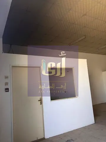 AMAZING OFFER NEAT CLEAN WAREHOUSE WITH OFFICE TILE FLOOR RENT 65K AREA 1100 SQFT AL SAJJA AREA NEAR ROAD.