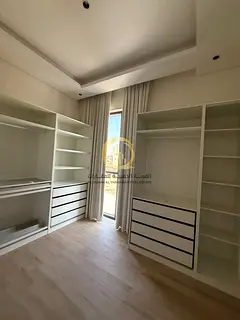 For sale: a residential villa in Al-Houshi, Al-Badiyah district, Sharjah. Prime location, second plo