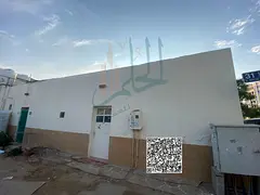 Arab house for sale at an excellent price in Al Bustan, corner location on two streets, currently re