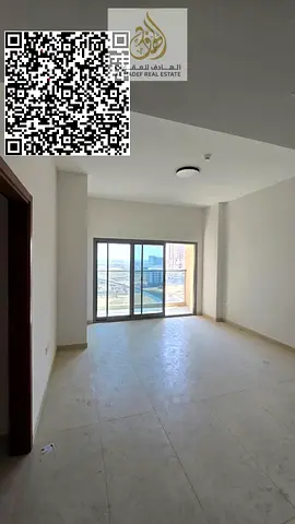 One bedroom, living room, two bathrooms, balcony, built-in wardrobes, and an open kitchen.