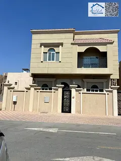 Villa for sale in Ajman, two floors plus a rooftop, at a bargain price. Excellent location. Freehold
