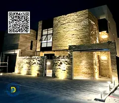 For sale in Al Bahia area, Ajman, a villa with 6 rooms and a roof, modern finishing. The price inclu