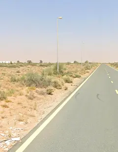 Residential land for sale in Sharjah, Rawdat Al Qurt area, Al Ruwaidat suburb.