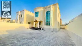 Villa for sale in Al Rawda 1, Ajman. 5 bedrooms, living room, majlis, kitchen, and maid's room.