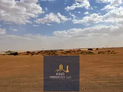 Own Commercial And Residential Land in Al Qasimia City