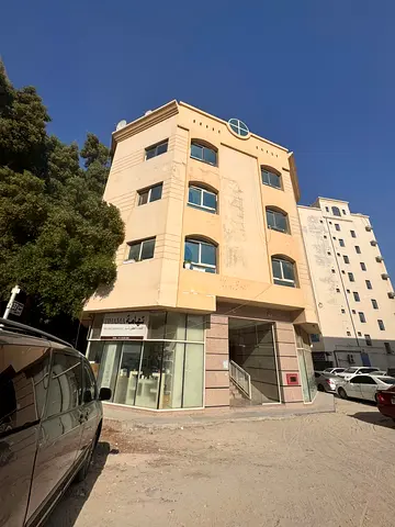 Building for sale in the United Arab Emirates, Sharjah, Al Naba’a area. It consists of a ground floor and three upper floors.