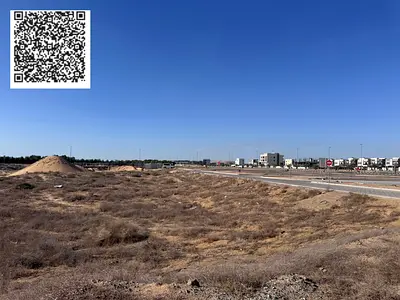 Land for sale in Ajman, Al Alia area, residential/commercial. Building permit: Ground + 5 floors. Land area: 1250 square meters (approximately 13455 s