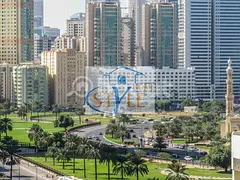 Two-bedroom apartment in Al Majaz 2, directly on King Faisal Road