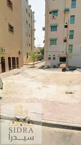 للبيع أرض سكنية تجارية  (شارع وسكة) بتصريح G+4 في النخيل 2-موقع جدا مميز