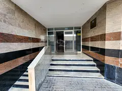 Building for sale in Sharjah, Al Butina area, prime location on a main street