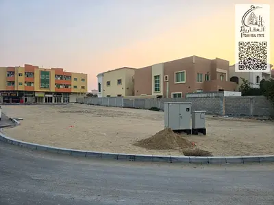 Land for sale, residential/commercial, corner plot on two streets, on a main road from the new Sheikh Mohammed bin Zayed Bridge and close to Sheikh Ma