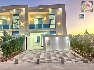 Direct from the owner, including registration and ownership fees: A villa in one of Ajman's most luxurious villas, built and finished to a super deluxe standard, with very large rooms and a spacious l
